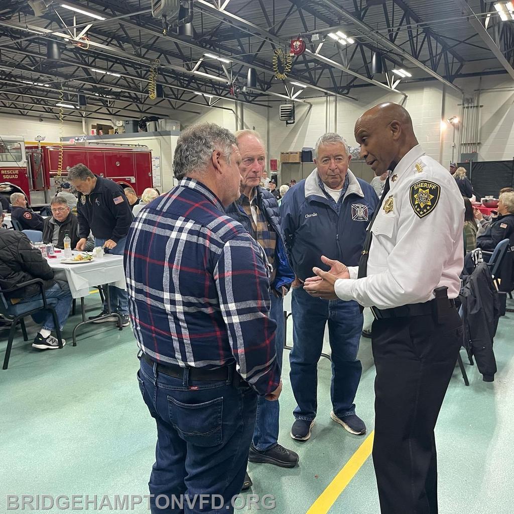 Area members speak with the Sheriff.