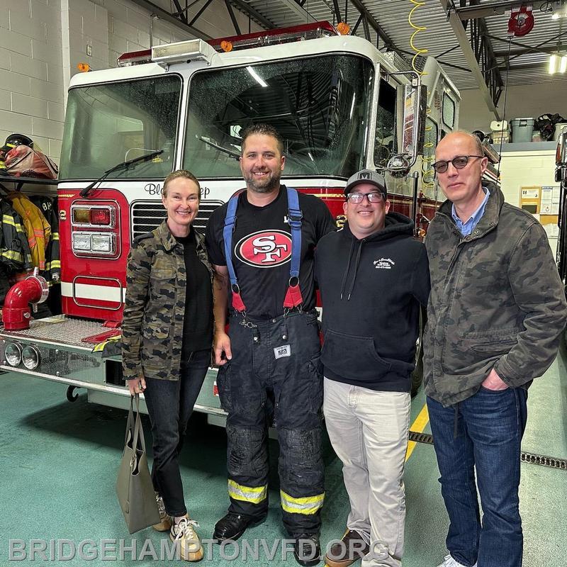 May, 2023:
Helena and Per Skarstedt stopped at the firehouse Saturday to thank the firefighters who, thanks to some quick thinking, saved their house in an early morning fire. The Skarstedts are pictured here with Rescue Squad First Assistant Captain Brian Murphy, second from left, and Packard Assistant Captain Nick Dombkowski who responded with the engine.

On Saturday, around 4:05 a.m., Captain Murphy and Mack Co. Captain Zach Broadmeadow responded to an automatic fire alarm at a house on Daniel’s Lane in Sagaponack. Southampton Town police’s Sagaponack unit arrived and confirmed it was a working structure fire.

The two captains arrived on scene at the same time and found the front door locked so they began banging on it to try and awake anyone sleeping inside, but luckily no one was home. During a 360 of the residence, they found the fire in the back corner on the second floor’s exterior  wall and deck.

As Captain Broadmeadow went to retrieve a water can, Captain Murphy found a garden hose and a painter’s extension ladder that had been left outside. He set up the ladder and climbed up with the hose in hand and the officers came and footed the ladder. “We were able to contain and extinguish the fire within a few minutes,” Captain Murphy said. 

The Skarstedts were very thankful for their actions. Job well done! Thank you to them and all the firefighters who responded quickly Saturday morning to what could have been a catastrophic fire.