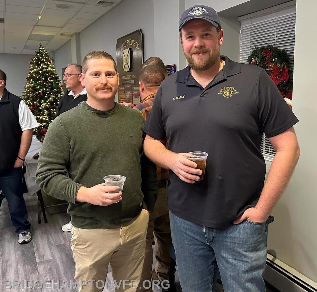 2nd Asst. Chief Dillon Berkoski chats it up with fellow Chief from Sag Harbor. 