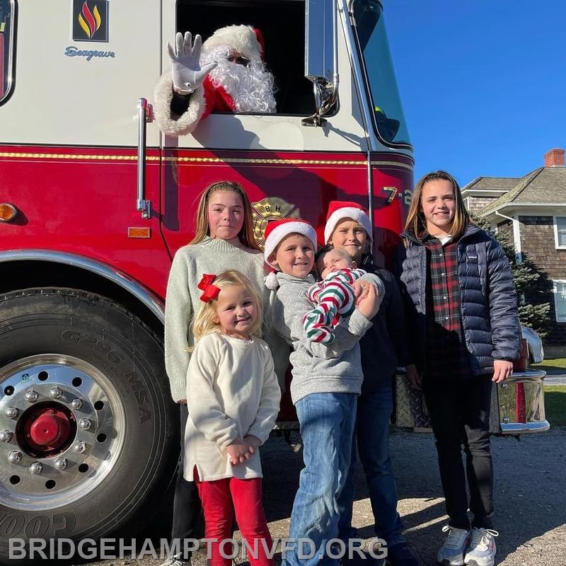 Special thanks to firefighter Nick Dombkowski for chauffeuring Ol' Saint Nick around and to EMT Mafe Lopez for helping with his list. 