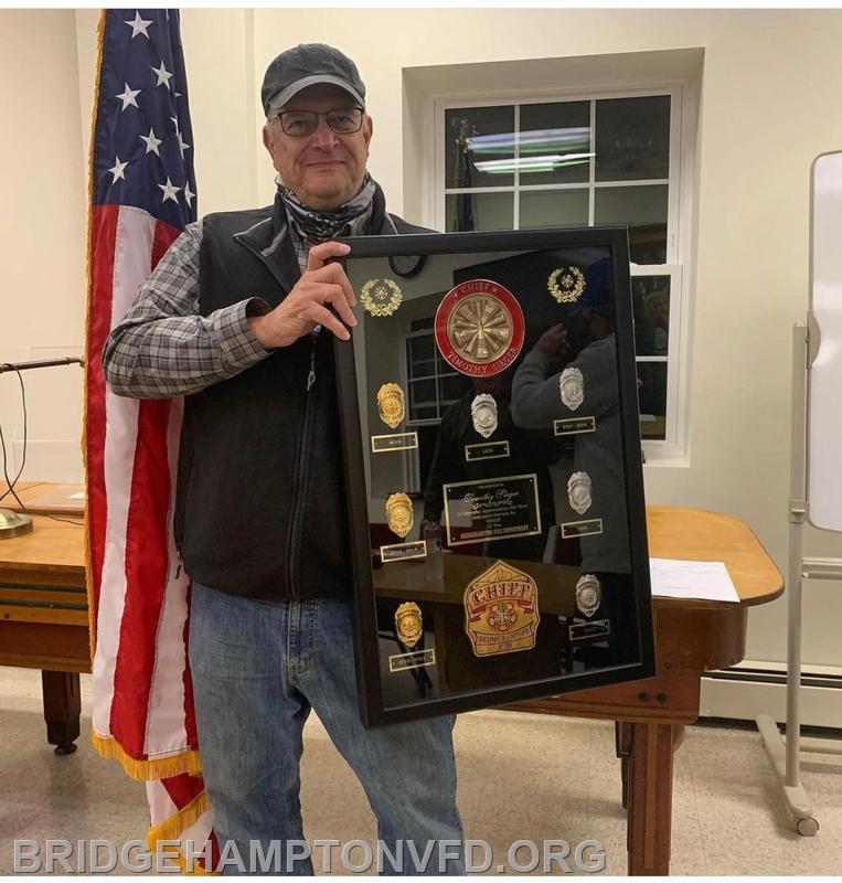 October 5, 2020: Ex-Chief Tim Sieger was presented with a shadow box full of his badges from his 40-plus years in the fire service, as a thank you for serving as chief in 2018. Thank you, Chief!