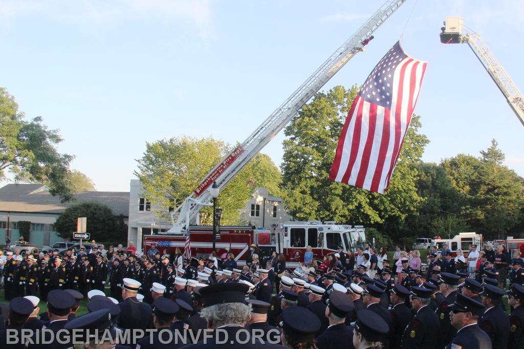 Bridgehampton Fire Department helps to craft the Flag Arch for the service. 