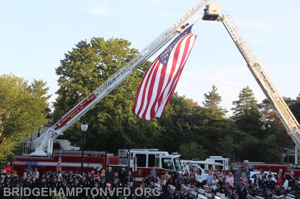 Bridgehampton Fire Department helps to craft the Flag Arch for the service. 